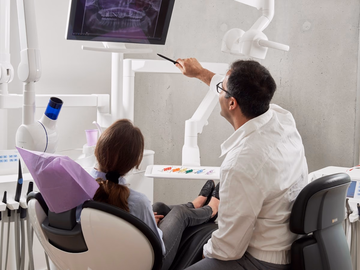 Dental professional workspace with clean clinical equipment.